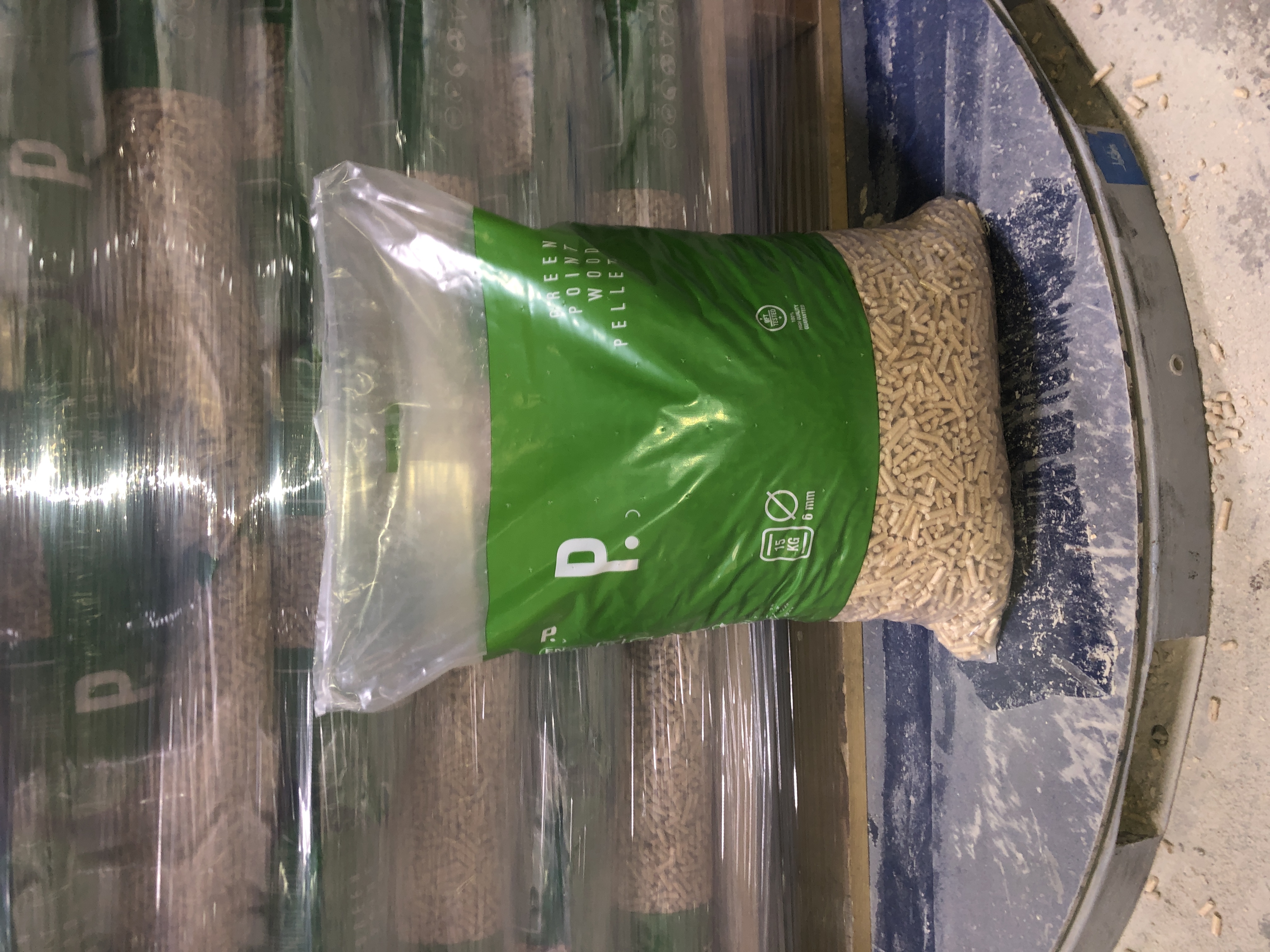 Green pellet bag on production line
